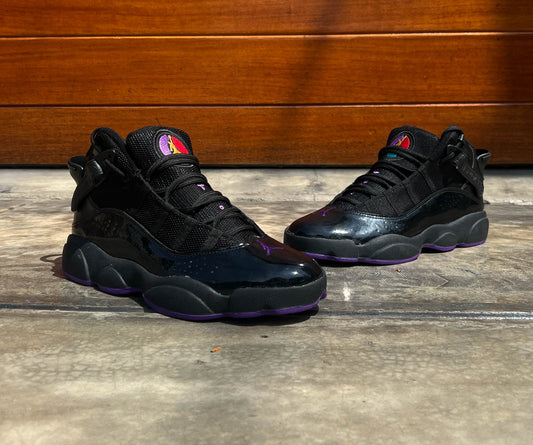 JORDAN RETRO 11  BLACK AND PURPLE