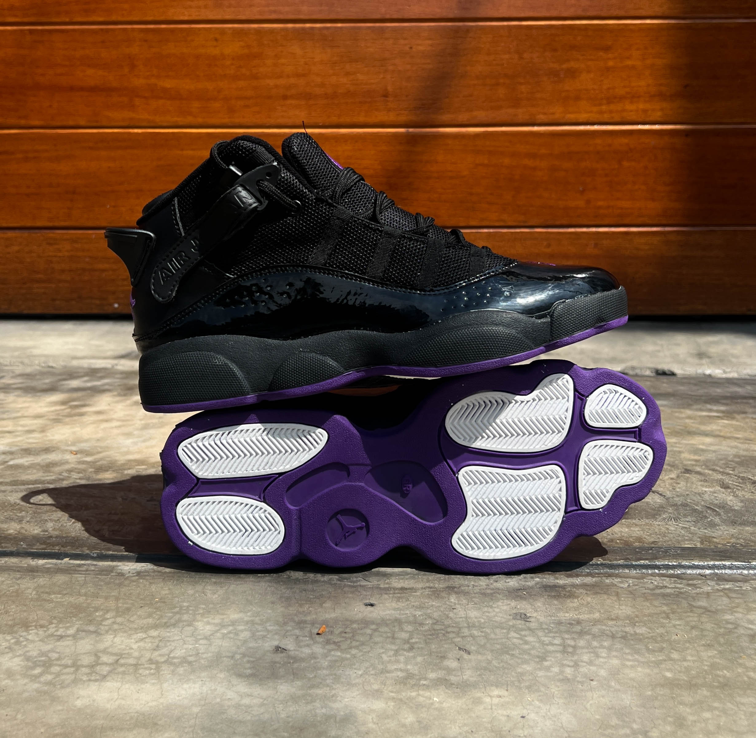 JORDAN RETRO 11  BLACK AND PURPLE