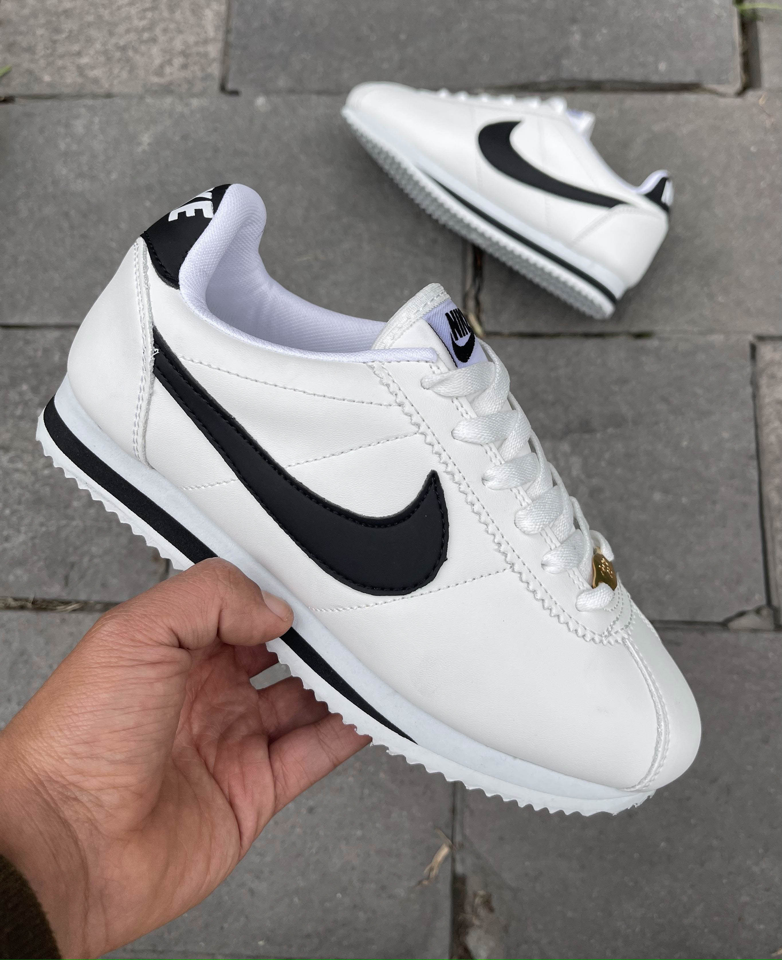 NIKE CORTES WHITE AND BLACK