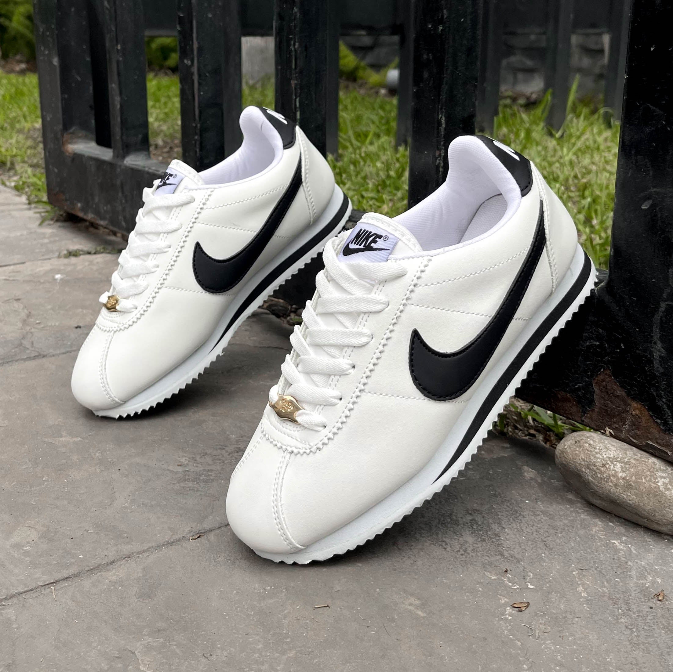 NIKE CORTES WHITE AND BLACK